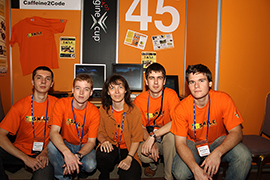 Our team and Professor Bieliková at the team’s booth during the competition